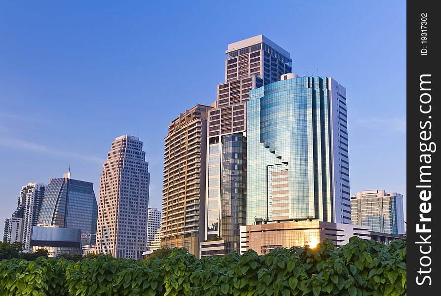 Building in Bangkok with a foreground leaves in a park in Bangkok, Thailand(building location building in Thailand , can take photographs do ? all right , do not be copyright disobedience anything ). Building in Bangkok with a foreground leaves in a park in Bangkok, Thailand(building location building in Thailand , can take photographs do ? all right , do not be copyright disobedience anything )