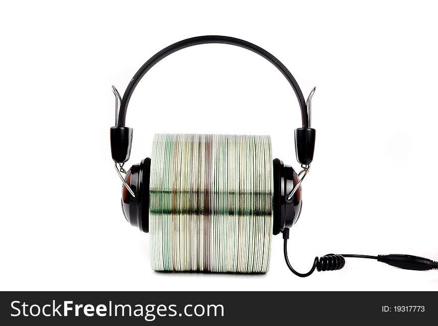 cd with headphones clamped isolated on white background