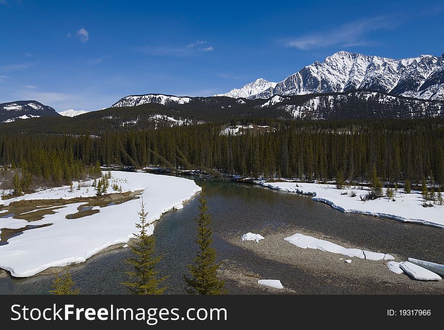 Shallow Crystal Blue Mountain River in Banff