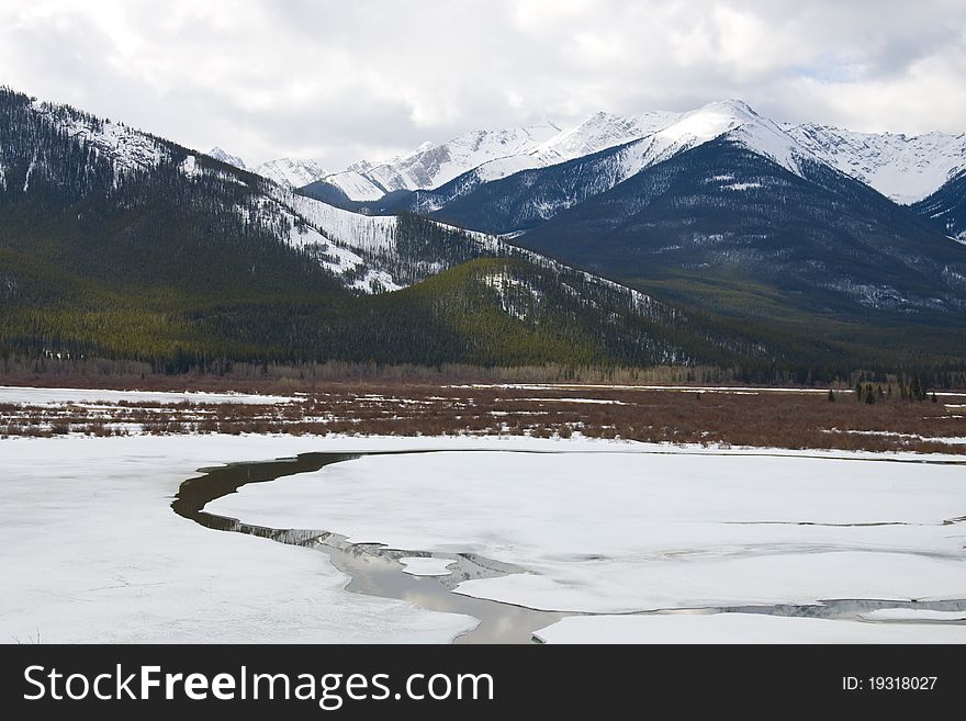 Winter scene of Vermilion Lake, located in Banff National Park, Alberta, Canada Frozen over and accessable for snow shoeing and ice fishing. Winter scene of Vermilion Lake, located in Banff National Park, Alberta, Canada Frozen over and accessable for snow shoeing and ice fishing