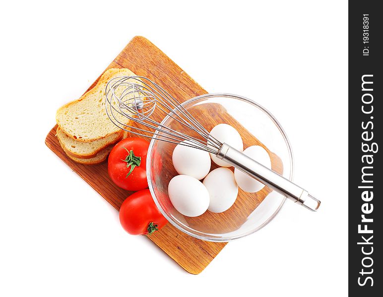 Eggs with tomatoes and bread