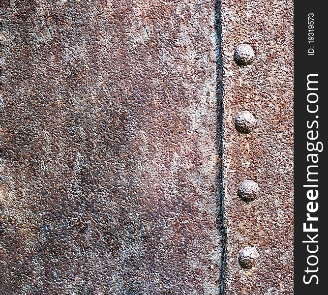 A metal texture and rivet