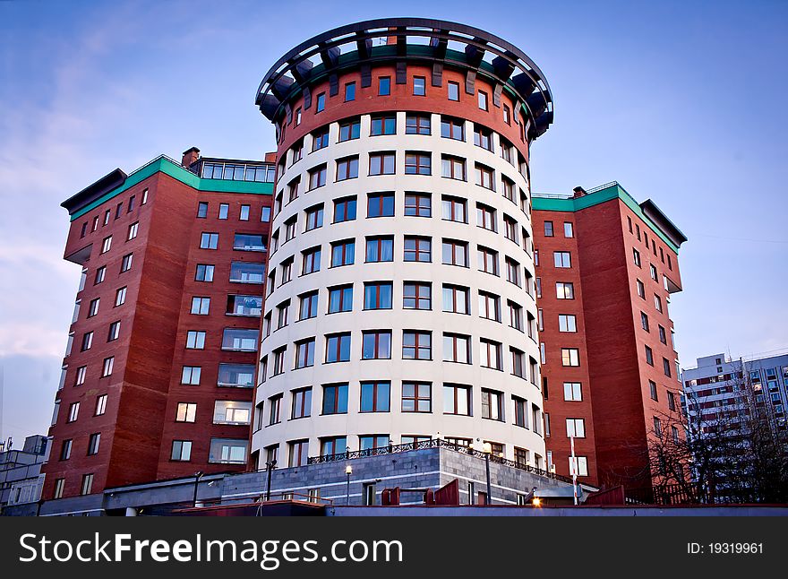 Multi-storey apartment building at evening