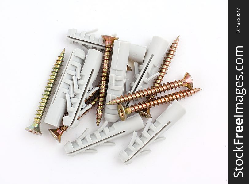 Dowels and screws on a white background