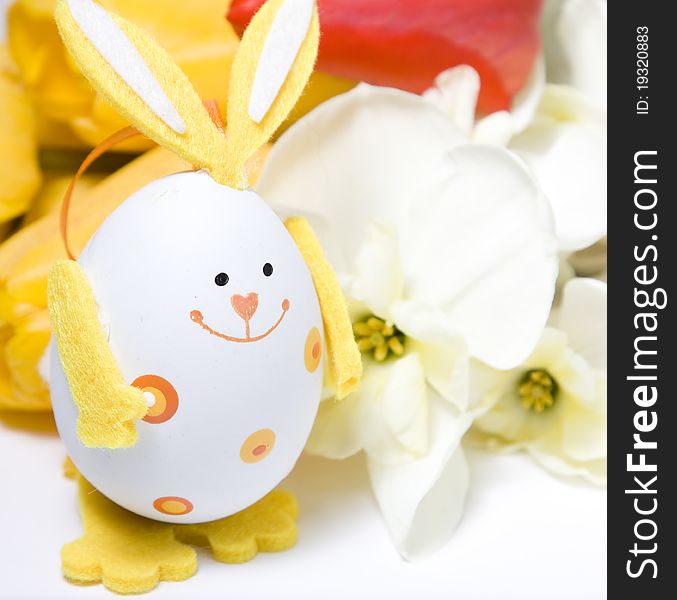 Bunny shaped easter eggs and daffodil