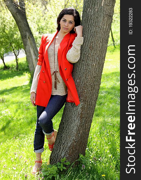 Beautiful Brunette Girl In Red Coat