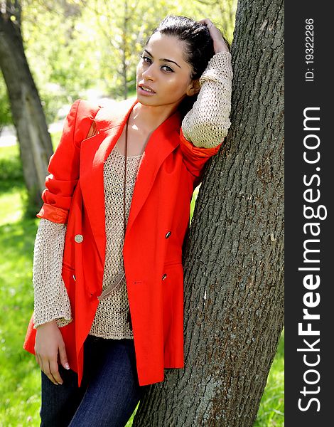 Beautiful Brunette Girl In Red Coat