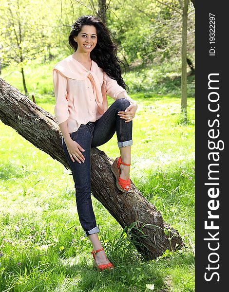 Beautiful Young Brunette Model In The Park