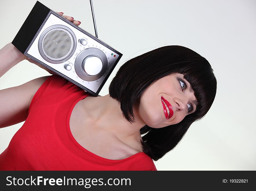 Portrait of a woman with radio. Portrait of a woman with radio