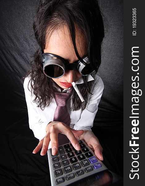 Woman with calculator in glasses