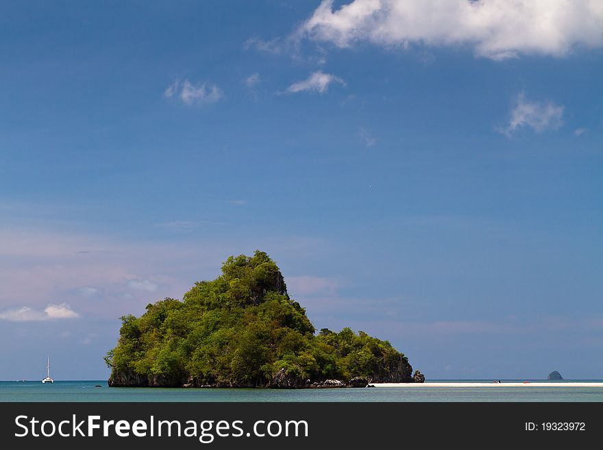 This is small island from Krabi Thailand with some with beach on right side. This is small island from Krabi Thailand with some with beach on right side.