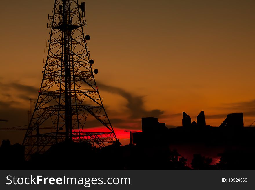 Antenna with a sunset backdrop.