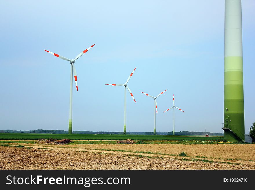 Five power windmills in the field