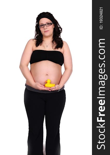 Beautiful pregnant woman holding small toy duckie