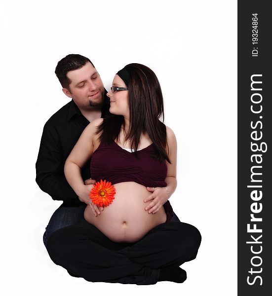 Happy Expecting Couple With Hands On Belly