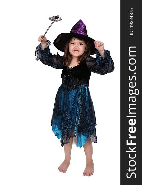Cute little girl in witch costume making a face. isolated on white. Cute little girl in witch costume making a face. isolated on white