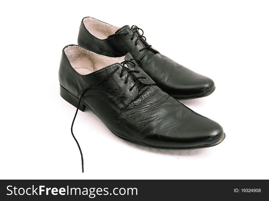 The image of man's leather shoes under the white background