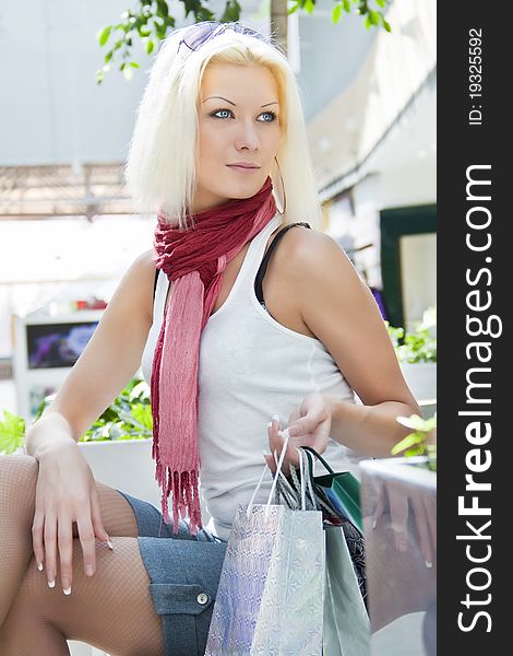 Portrait Of Woman At The Mall With Bags Copyspase