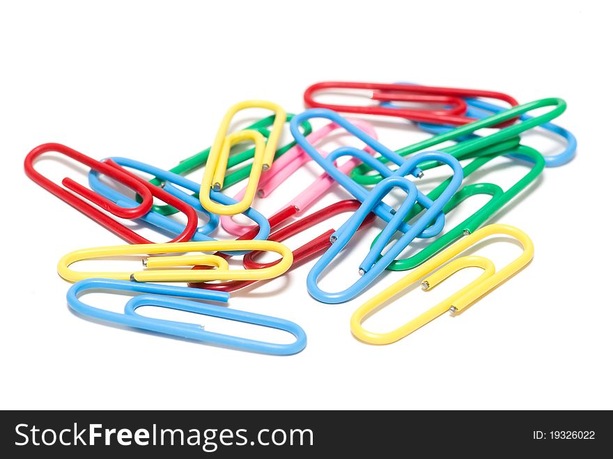 Paper clips on a white background. Paper clips on a white background