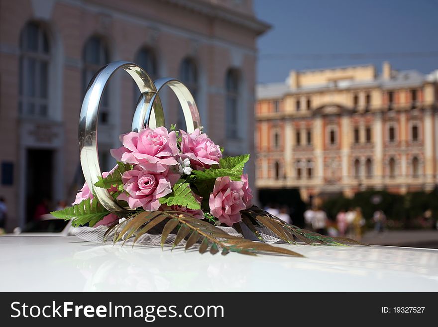 Wedding rings on the roof of the limousine. Wedding rings on the roof of the limousine