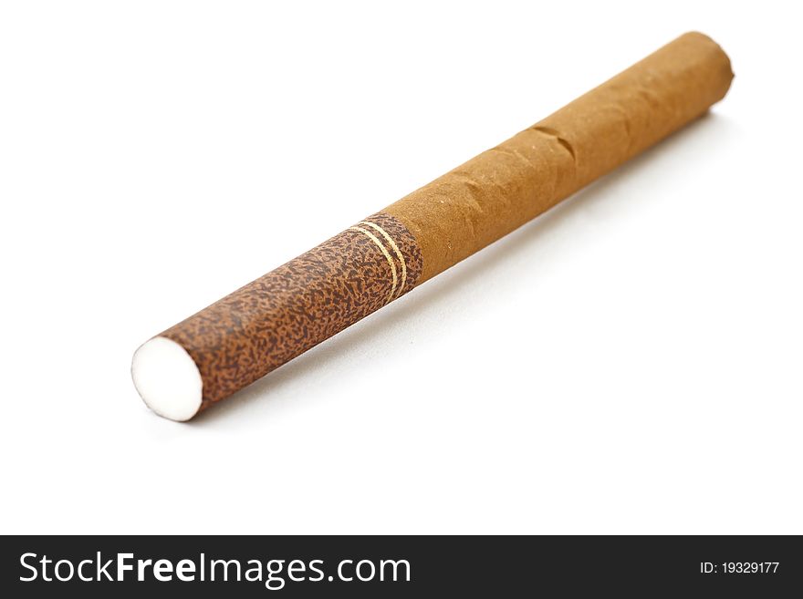 Brown cigarette isolated on a white background