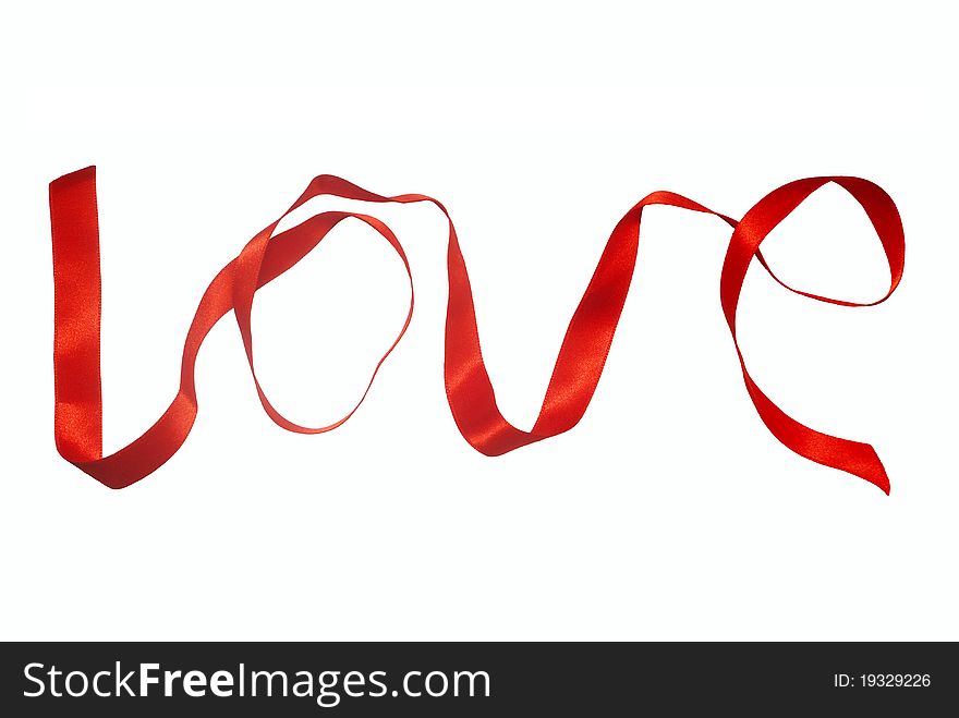 Word love made of red ribbon isolated on white