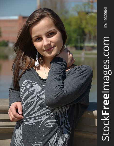 Sweet, young girl portrait. Teenage model in Poland wearing casual dress, smiling gently. Sweet, young girl portrait. Teenage model in Poland wearing casual dress, smiling gently.