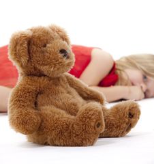 Teddy Bear And Resting Girl Royalty Free Stock Image Teddy Bear And Resting Girl Royalty Free Stock Image