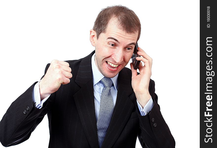 Angry businessman is speaking on the phone