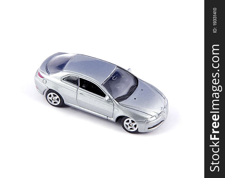 Grey toy car. Car on a white background. Grey toy car. Car on a white background