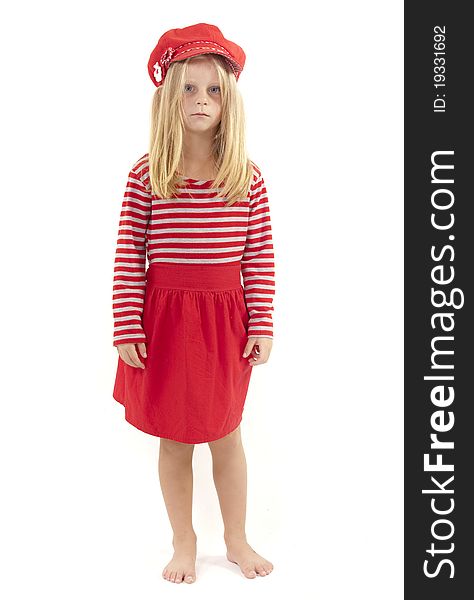Little girl in red hat and dress looking confused and unhappy. On white background. Little girl in red hat and dress looking confused and unhappy. On white background.