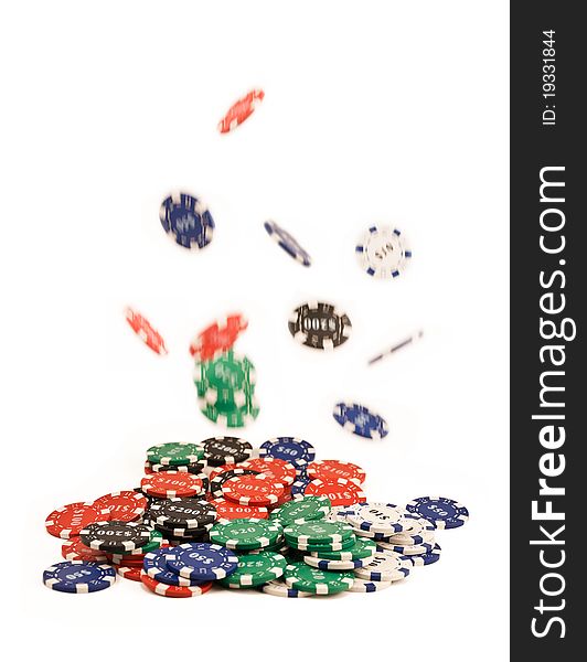 Bunch of falling casino chips isolated on white. Bunch of falling casino chips isolated on white.