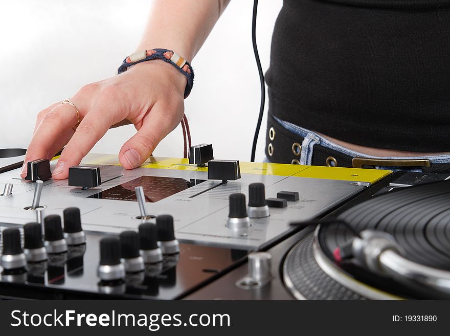 Hands Of Female DJ On Mixing Controller