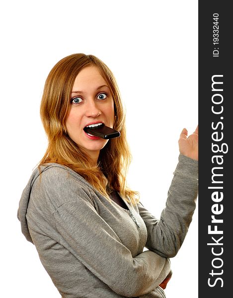 Woman holding mobile phone in mouth. Woman holding mobile phone in mouth