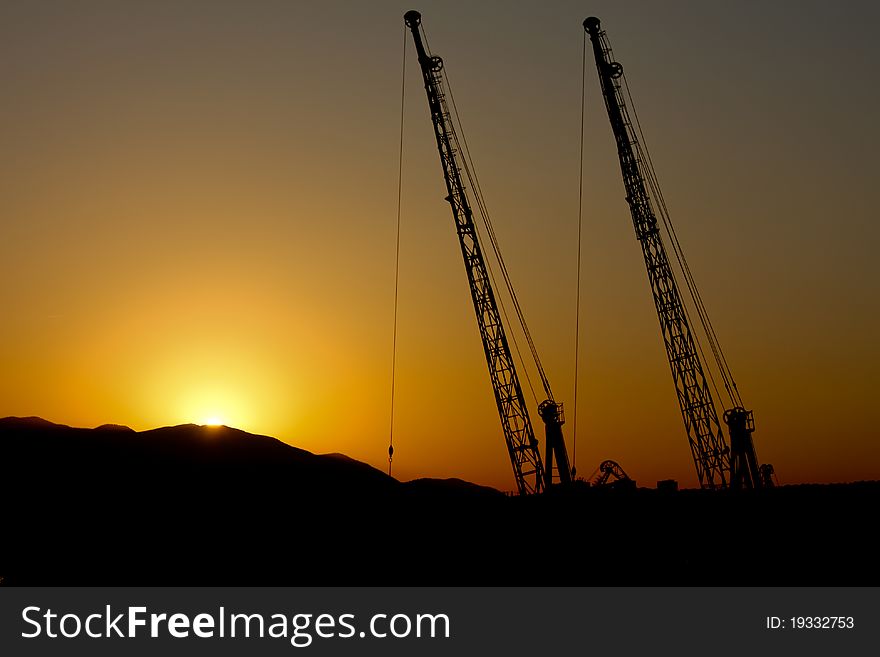 Two cranes just before sunset