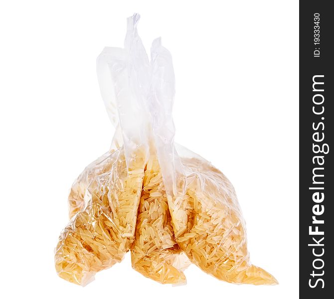 Rice ready to boil in plastic bags isolated over white background. Rice ready to boil in plastic bags isolated over white background.