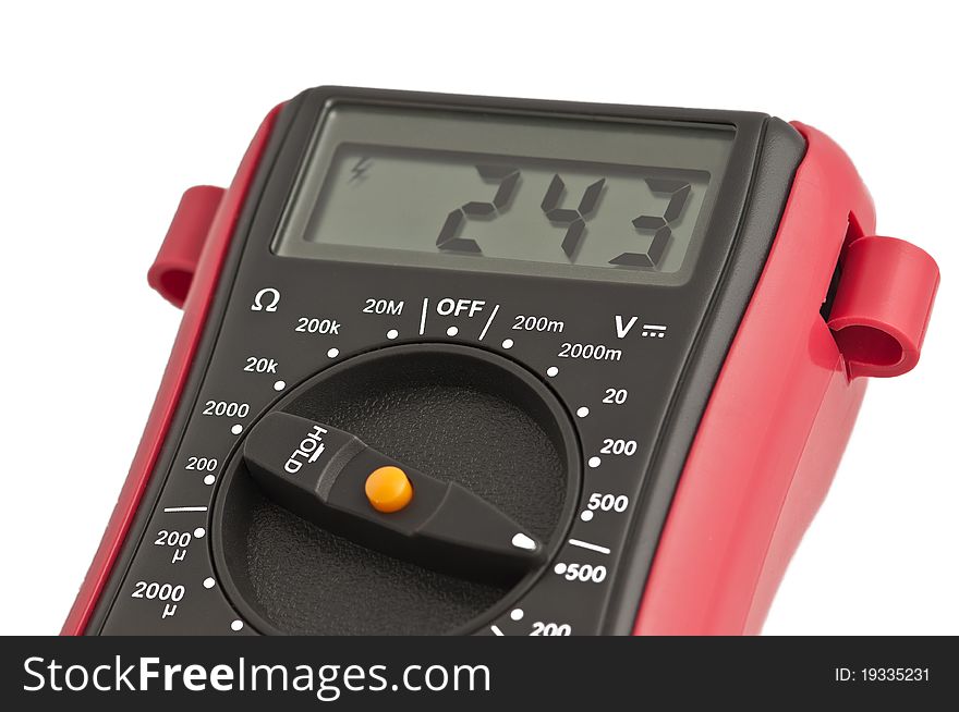Digital multimeter measures the voltage in an electrical network