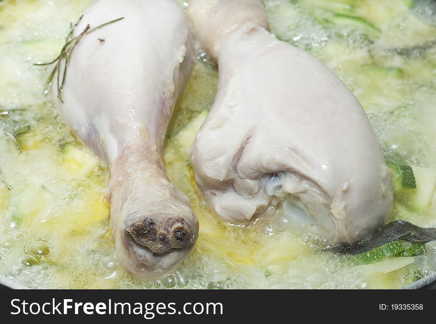 Chicken fried with zucchini and onions