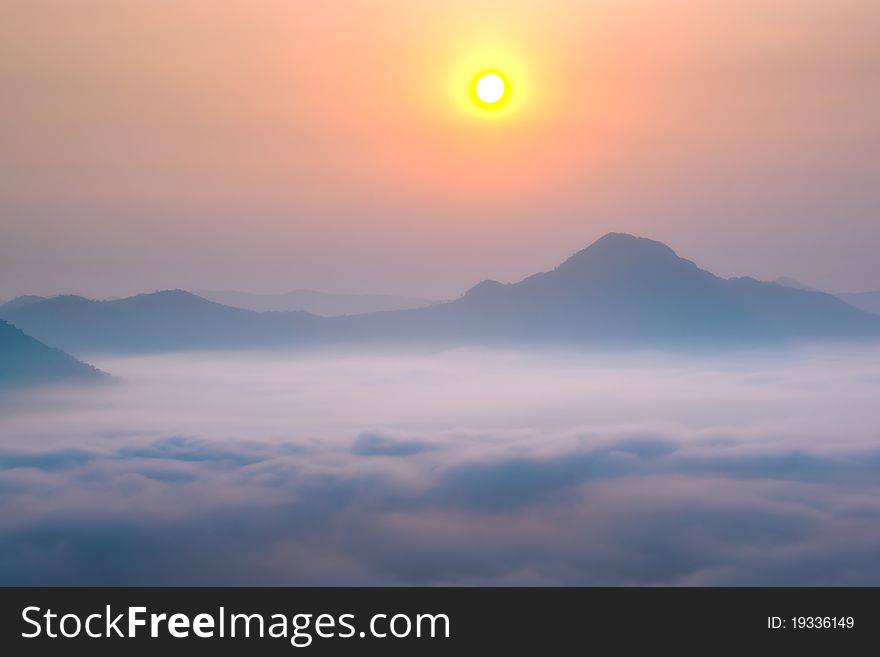 Viewpoint sunrise on the mountain, the mountain filled with mist. Chiang Khan, Loei Province, Thailand. Viewpoint sunrise on the mountain, the mountain filled with mist. Chiang Khan, Loei Province, Thailand.