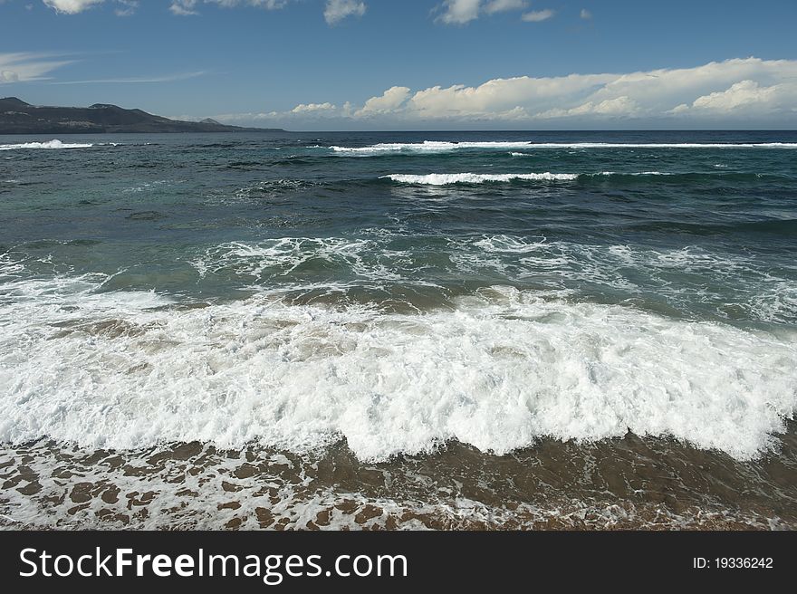 Strong winds and big waves on Playa Las Canteras, surfers favorite beach. Las Palmas De Gran Canaria, Canary Islands, Spain