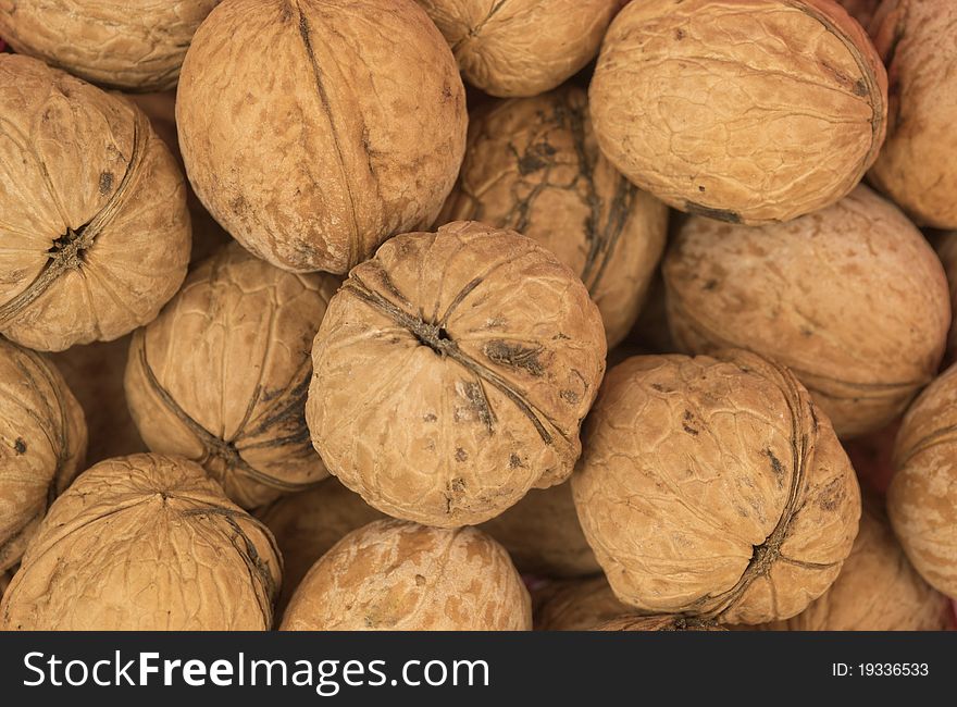Background of walnuts, close up. Background of walnuts, close up
