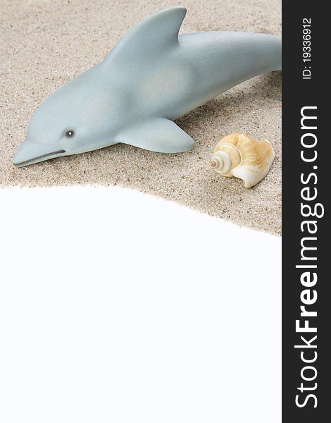 Dolphin and seashell on sand. Dolphin and seashell on sand