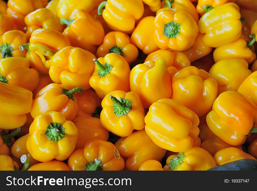 Closeup shot of fresh raw yellow peppers. Closeup shot of fresh raw yellow peppers.