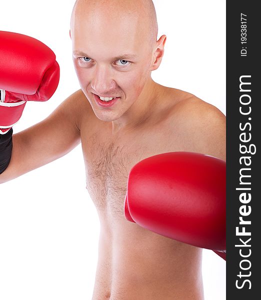 Bold boxer during fight in red gloves. Bold boxer during fight in red gloves