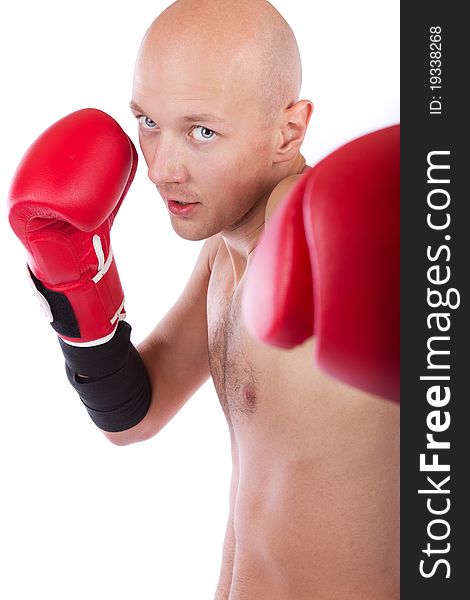 Young boxer wearing red gloves. Young boxer wearing red gloves