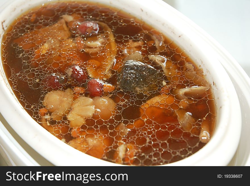 Image of herbal soup on the bowl