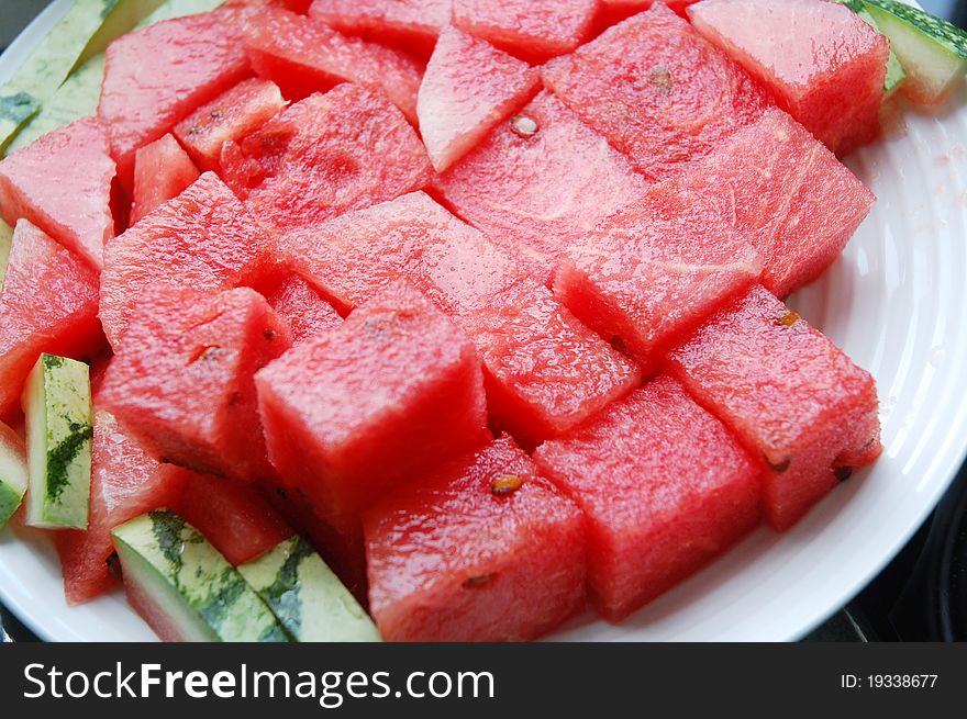 Appetizing slices of watermelon isolated on plate