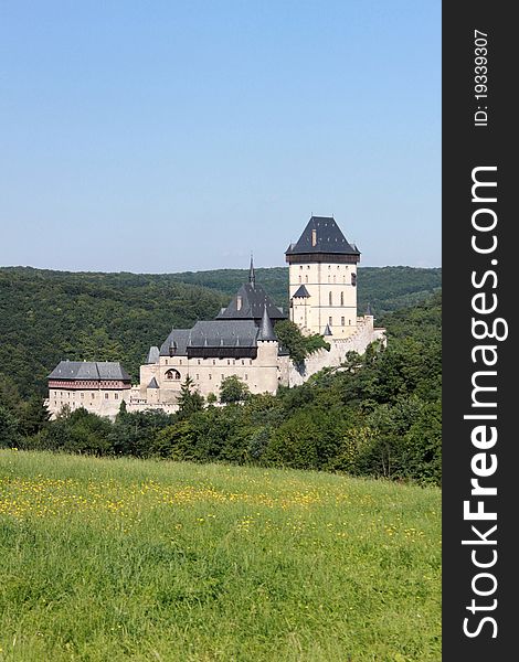 The view  of Karlstejn Castle in Prague from the glade. The view  of Karlstejn Castle in Prague from the glade