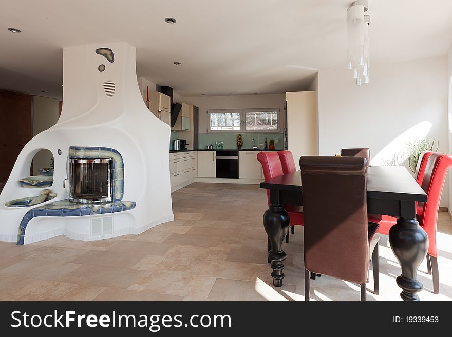 Interior with chimney, bright room and modern architecture