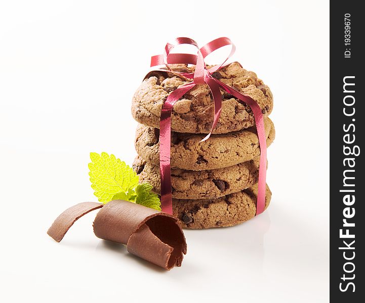 Stack of chocolate cookies tied with a ribbon